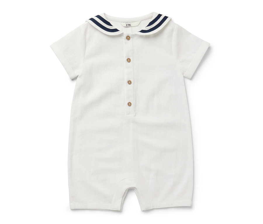 Barboteuse de style marin pour bébé, blanche avec des rayures bleu marine sur le col.