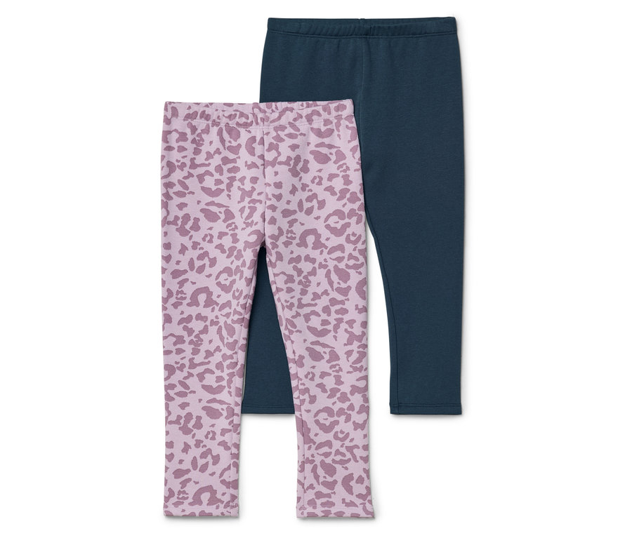 Deux leggings, un bleu marine et un rose clair à motif léopard, sont superposés.