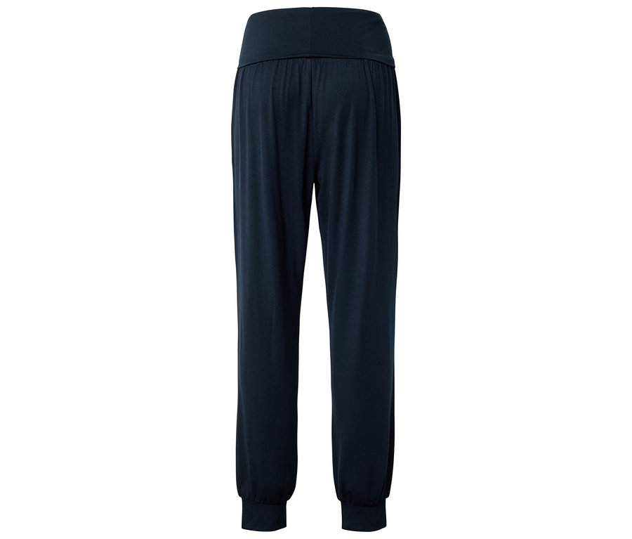 Pantalon long bleu marine avec large ceinture repliée et chevilles élastiquées.