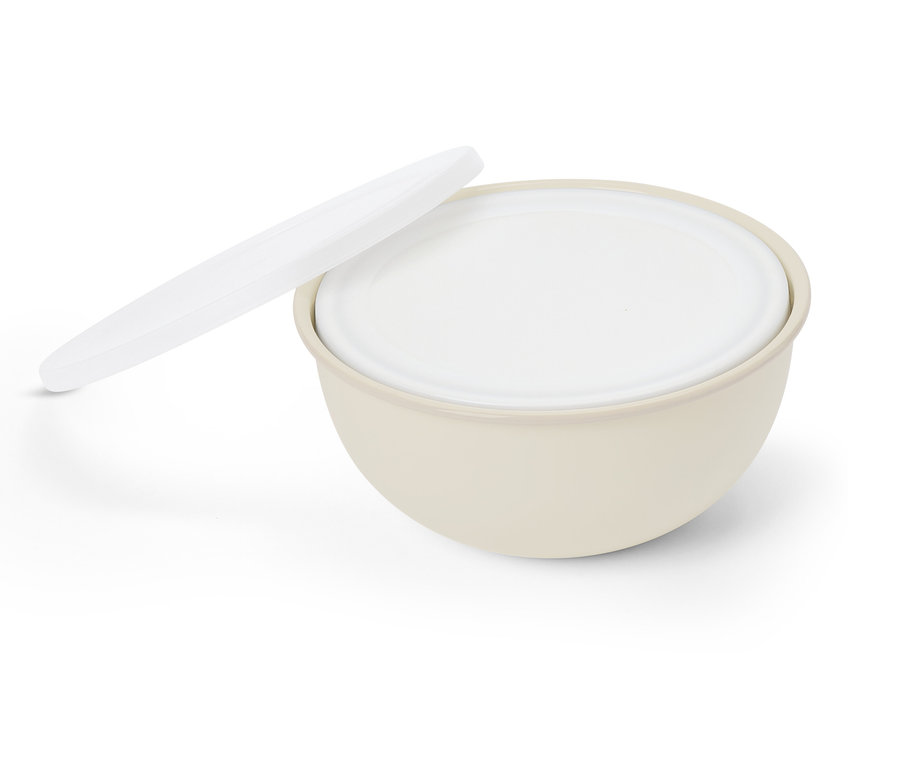 Bol beige avec couvercle blanc, dont une partie est à côté du bol.