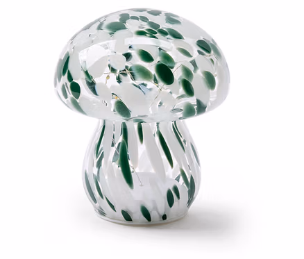 Lampe en forme de champignon en verre transparent avec des taches vertes et blanches et de petites lumières LED à l'intérieur.