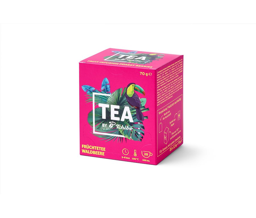 Emballage de TEA by Tchibo infusion aux fruits des bois – 8x 20 sachets. Un toucan est représenté sur l'emballage.