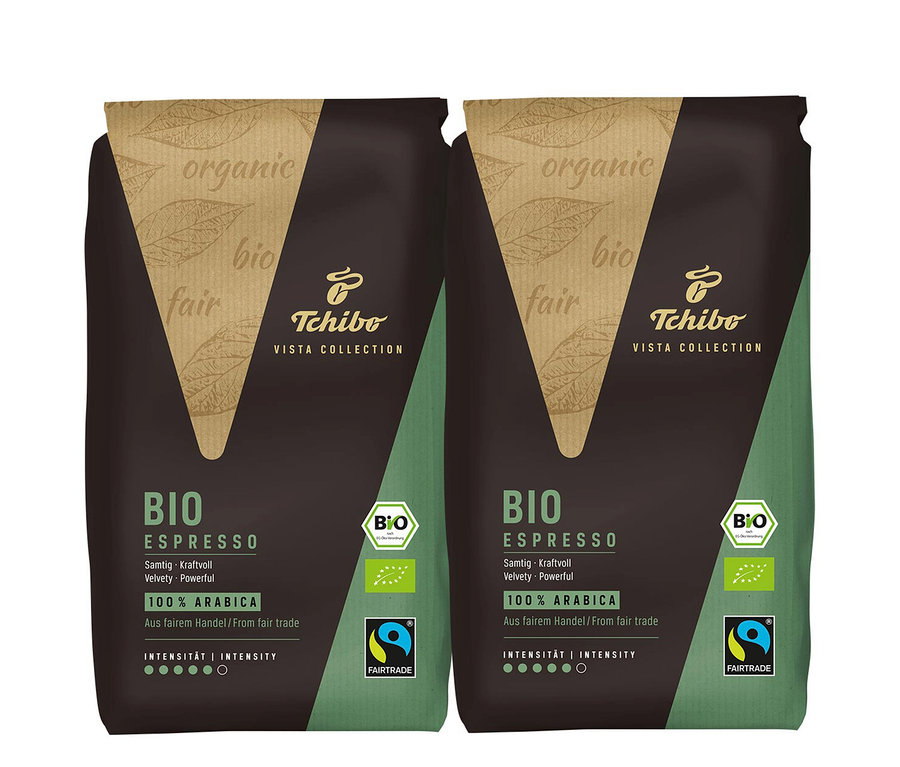 Deux paquets de BIO Espresso Tchibo VISTA COLLECTION. Les paquets sont marron et vert.