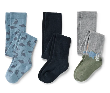 Trois paires de collants pour enfants : bleu avec des dinosaures, bleu foncé et gris avec un motif de dinosaures.