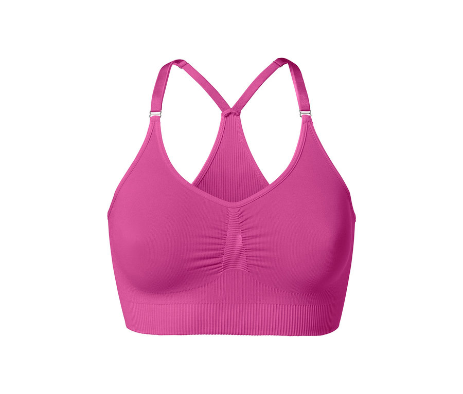 Gros plan d'une brassière de sport Seamless rose vif.