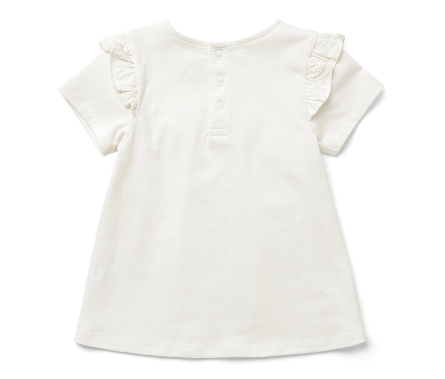 T-shirt blanc pour enfant à manches courtes et à volants.