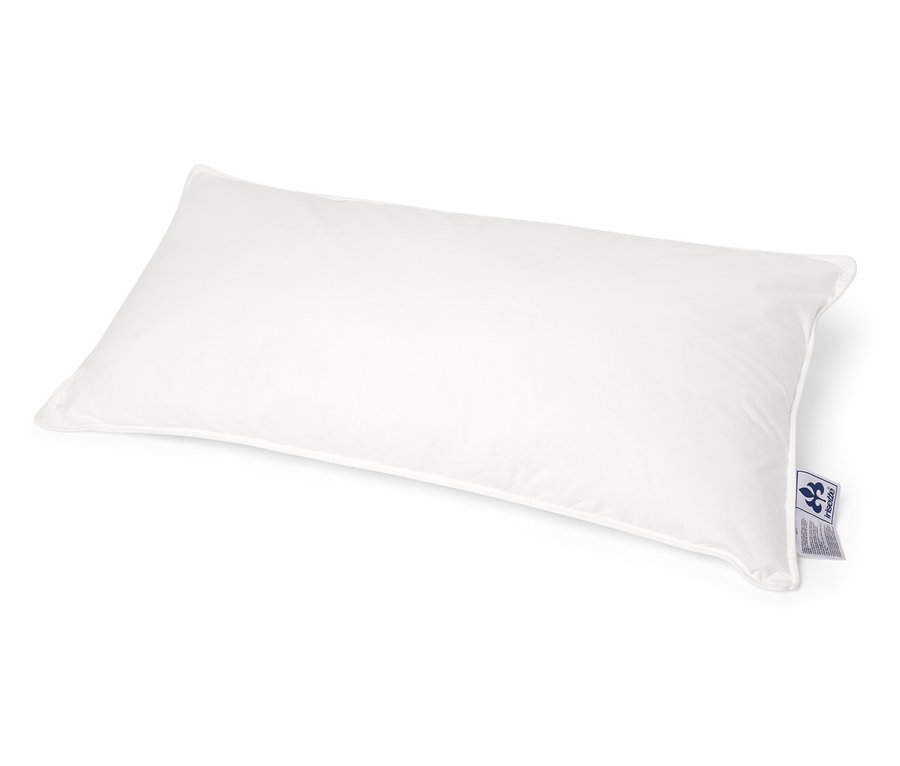 Un oreiller à eau irisette® blanc sur un fond blanc.