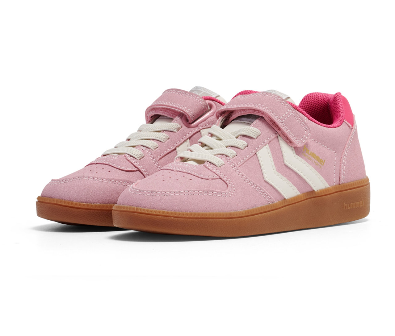 Deux baskets roses hummel® Handball Perfekt CL JR avec des lacets et une fermeture velcro côte à côte.