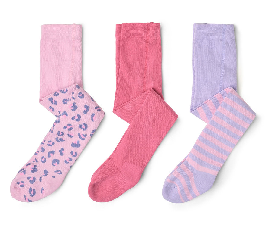Trois collants pour enfants : un rose à motif léopard, un rose uni et un violet rayé.