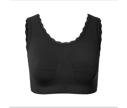 Soutien-gorge de sport noir avec dentelle sur fond blanc.
