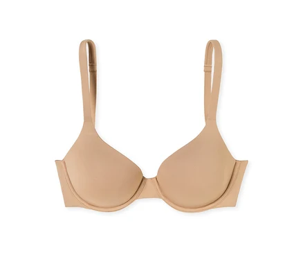 Soutien-gorge push-up beige à armatures avec bretelles réglables, sur fond blanc.