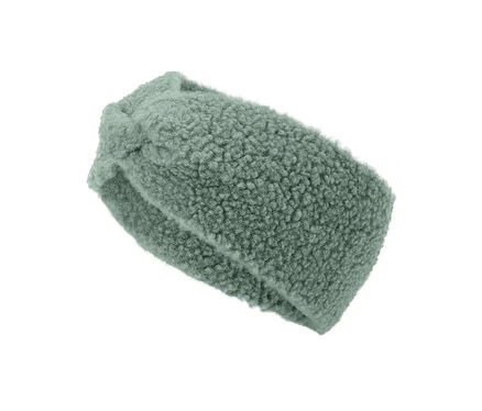 Un bandeau vert clair et duveteux avec un nœud repose sur un fond blanc.