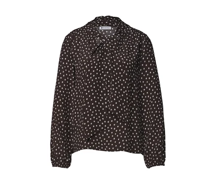 Blouse Street One marron foncé à pois blancs avec un col lavallière.