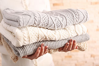 Veuillez lire les indications de lavage sur l'étiquette de votre pullover en laine.